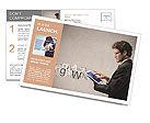 Young businessman working on a tablet Postcard Template