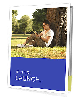 Man Using Tablet While Sitting Under A Tree. Presentation Folder