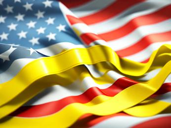 A close up of an american flag with a yellow ribbon PowerPoint Template