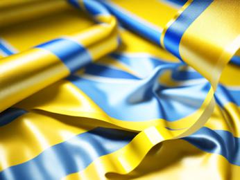 A close up of a blue and yellow fabric PowerPoint Template