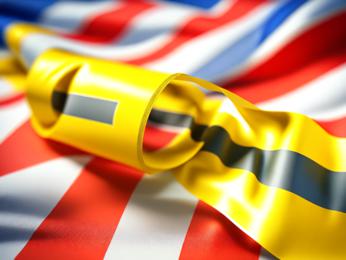 A close up of a pair of scissors on a flag PowerPoint Template