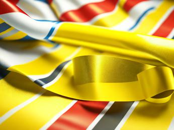 A close up of a yellow ribbon on a flag PowerPoint Template
