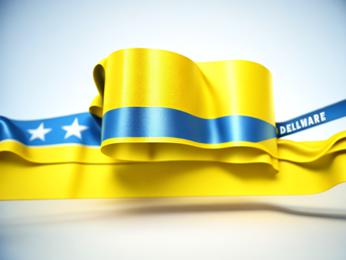 A blue and yellow ribbon with a white star on it PowerPoint Template