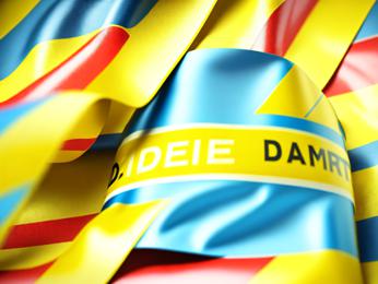 A close up of a flag with a name on it PowerPoint Template