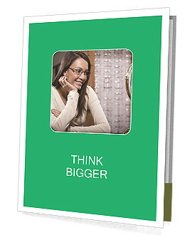 Smiling Hispanic Woman Trying On Spectacles In Mirror At Shop. Presentation Folder