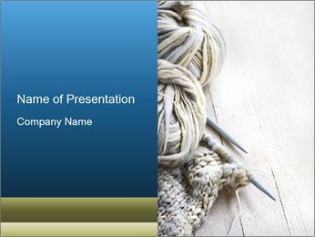 Natural Wool Background With Vintage Knitting Needles And Yarn On Wooden Surface PowerPoint Template