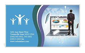 Business man in a suit stands back and looks at technology Business Card Template