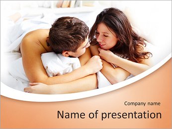 Young couple talking while lying in bed in the morning PowerPoint Template