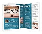 Closeup of reading glasses on the book. shot in the library Brochure Template
