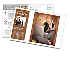 A young business woman is working on a laptop and talking on a phone in a box representing a small o Postcard Template